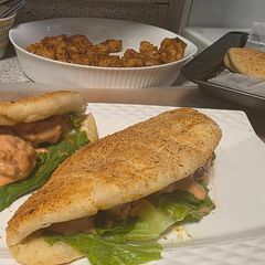 A picture of Dynamite chicken pita sandwich.