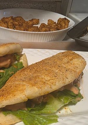 A picture of Dynamite chicken pita sandwich.