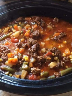 A picture of Hearty Crock Pot Cowboy Soup (hamburger soup).