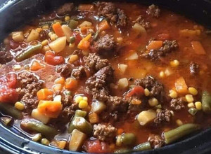 A picture of Hearty Crock Pot Cowboy Soup (hamburger soup).