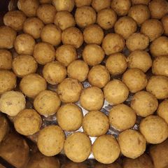 A picture of Besan and Wheat flour Laddoo.