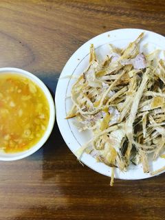 Hình của món Mực khô nướng chấm tương ớt 3 nốt nhạc.