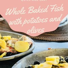 A picture of Whole Baked Fish with potatoes and olives.