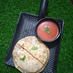 A picture of Nendran banana stuffed paratha.