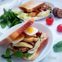 A picture of Beetroot Felafel Sandwich with Feta cheese salad.