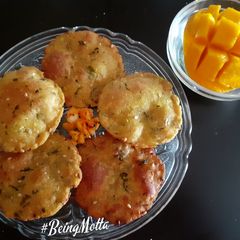 A picture of Sweet & Sour Mango Puris.