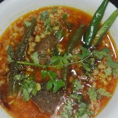 A picture of Mash ki Daal Gosht (Mutton).