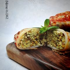 A picture of Dolmeh Kalam (Persian Stuffed Cabbage Rolls).