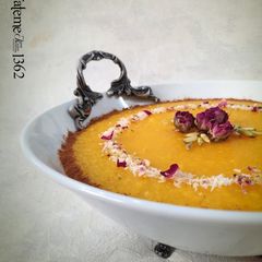 A picture of Sholeh Zard (Persian Saffron Rice Pudding).