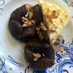 A picture of Baked ricotta and figs.
