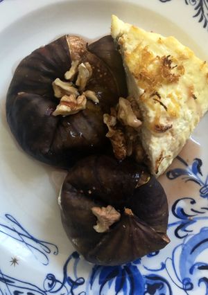 A picture of Baked ricotta and figs.