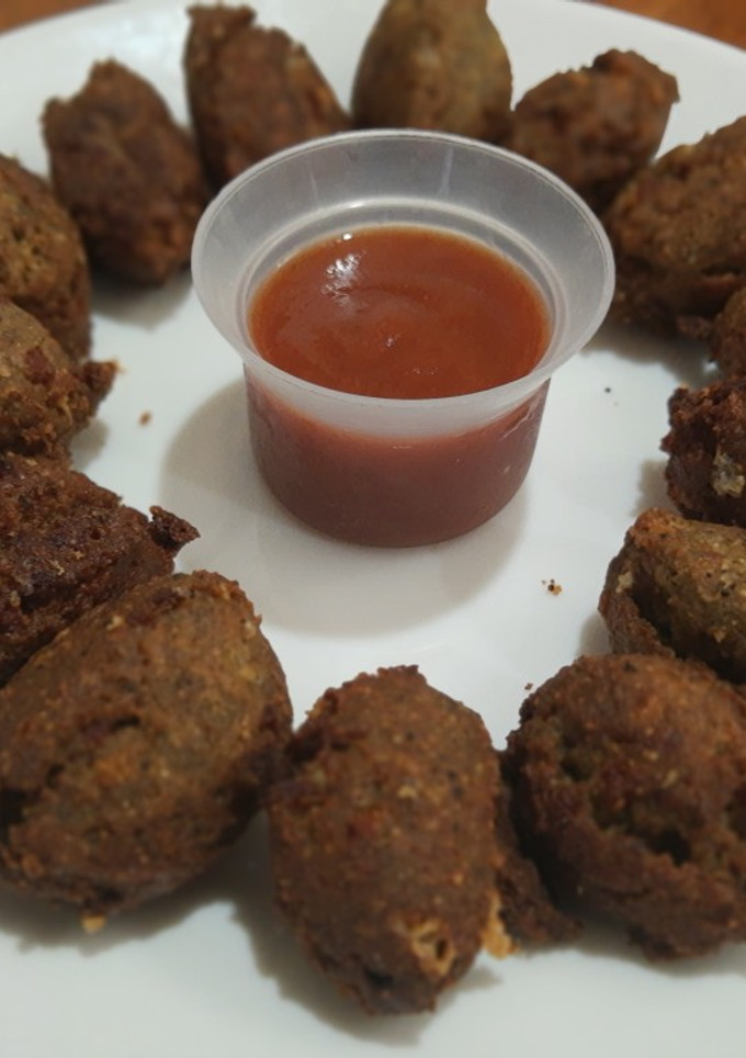 Una foto de Frituras de frijoles chinos, chorizo y queso