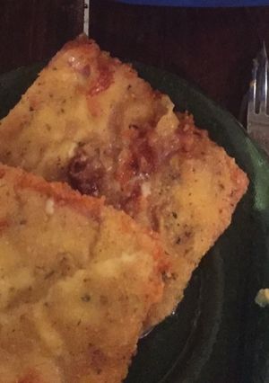 Una foto de Milanesas de jamón y queso