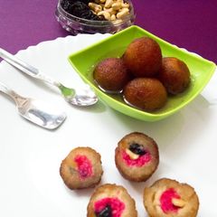 A picture of Strawberry jam nuts stuffed gulab jamun.