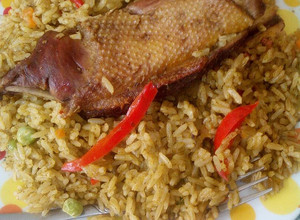 Una foto de Arroz con pato