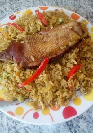 Una foto de Arroz con pato