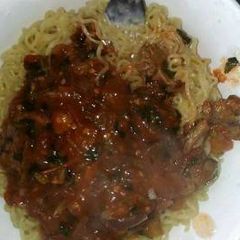 A picture of Spaghetti and beef stew.