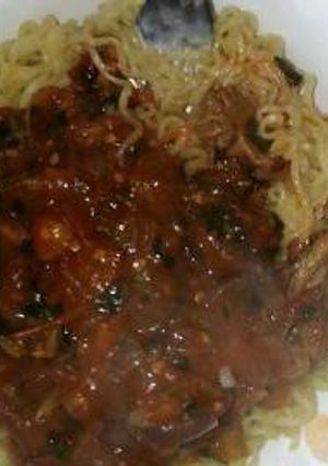 A picture of Spaghetti and beef stew.