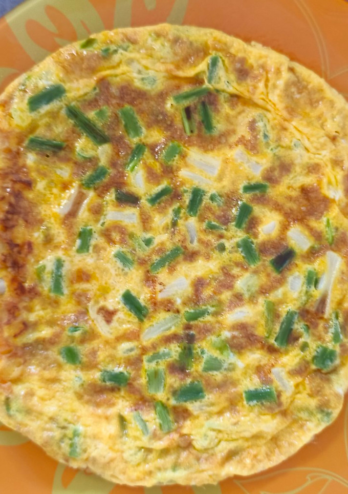 Una foto de Tortilla de ajetes tiernos