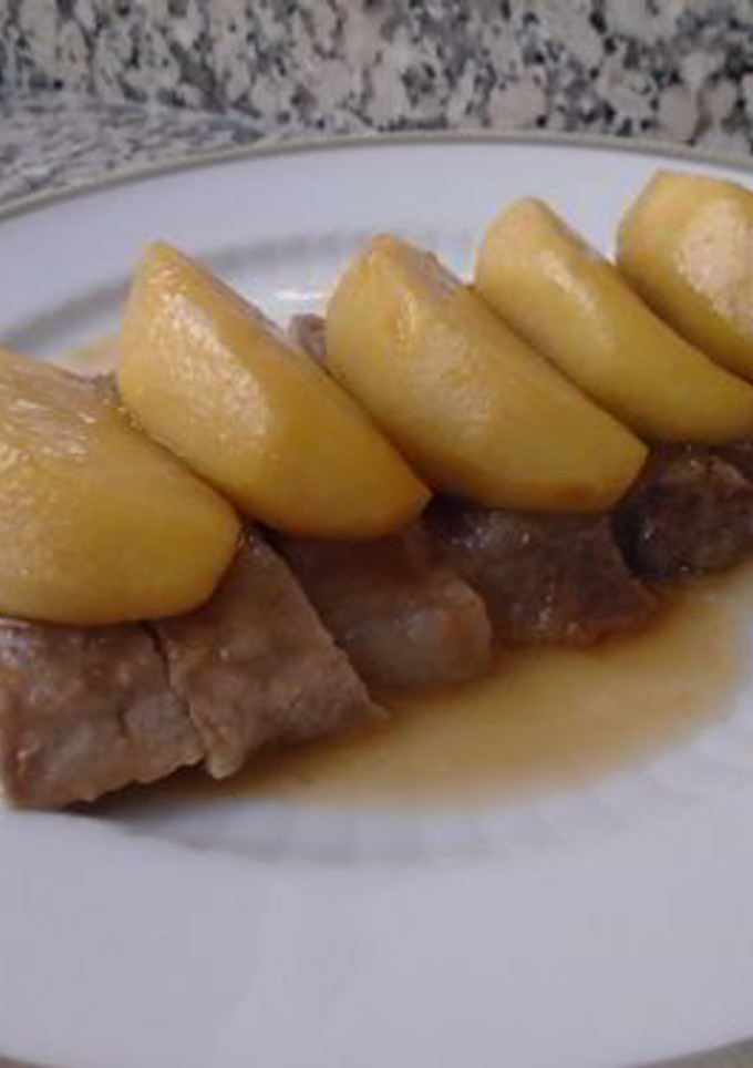 Una foto de Secreto de cerdo ibérico con salsa de manzana