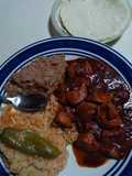 Asado de puerco y arroz rojo natural