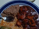Asado de puerco y arroz rojo natural