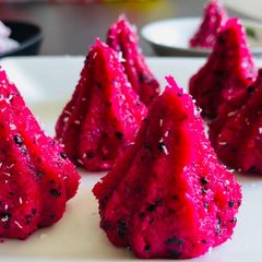 A picture of Dragon Fruit Coconut Modak.