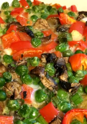 A picture of Peas & Peppers Hearty Quiche.
