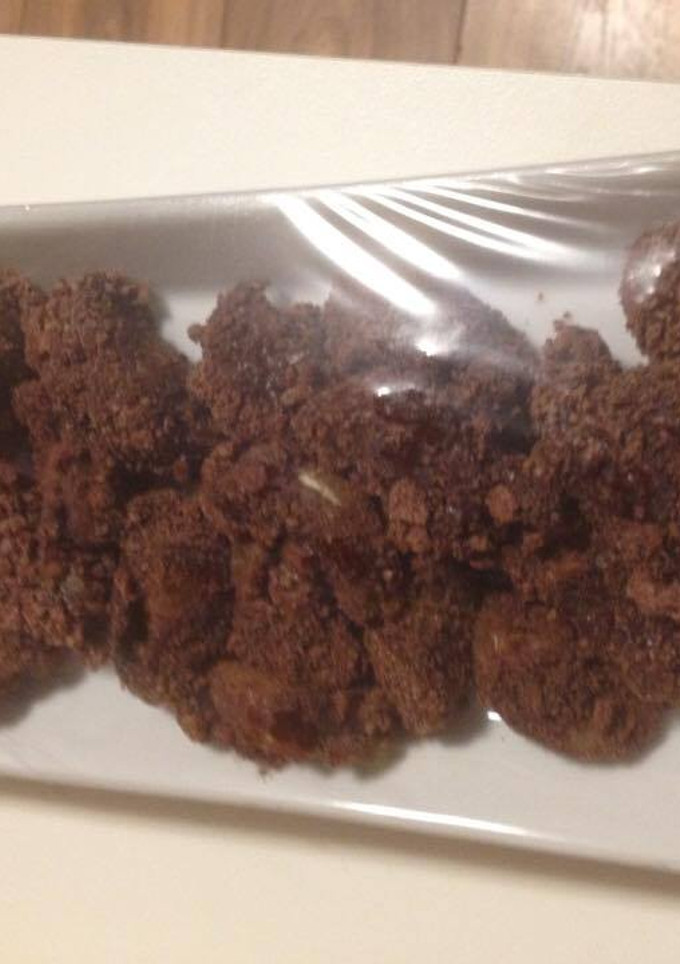 Una foto de Mandarinas crujientes bañadas de chocolate y cereales