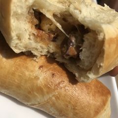 A picture of Cheesy, potatoes sausage rolls.