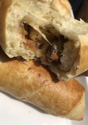 A picture of Cheesy, potatoes sausage rolls.