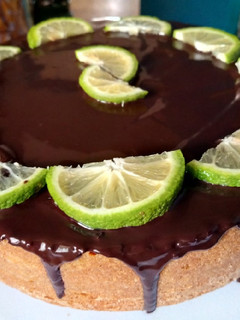 A picture of Lemon Cake with Chocolate drips.