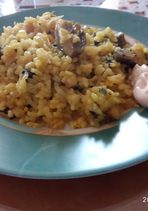 Una foto de Arroz con bacalao y espinacas