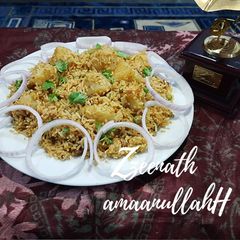 A picture of Aloo Dum Biryani.