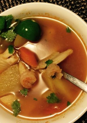 A picture of Caldo de Pescado con Camarón (Seafood Soup).