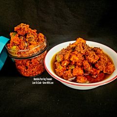 A picture of Raw Mango Gumberry Pickle - Gunda Keri Athanu - (Gujarati Style).