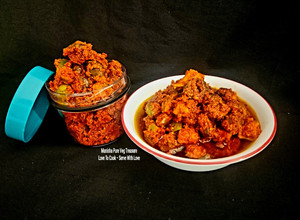 A picture of Raw Mango Gumberry Pickle - Gunda Keri Athanu - (Gujarati Style).
