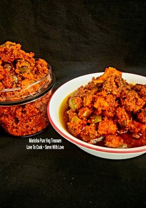A picture of Raw Mango Gumberry Pickle - Gunda Keri Athanu - (Gujarati Style).