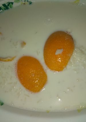 Una foto de Arroz con leche y naranja 🍊