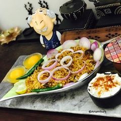 A picture of Hyderabadi Prawns Dum Biryani with Raita & Komola Bhog 💁‍♀️🍛😋.