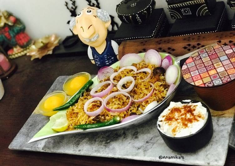 Easiest Way to Make Award-winning Hyderabadi Prawns Dum Biryani with Raita &amp; Komola Bhog