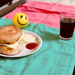 A picture of Aloo Muttor Tikki Burger.