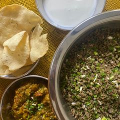 A picture of HARA LEHSAN with BAJRY KI ROTI And BAINGAN KA BHURTA.