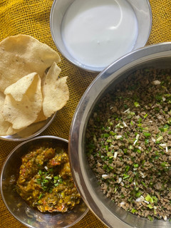 A picture of HARA LEHSAN with BAJRY KI ROTI And BAINGAN KA BHURTA.