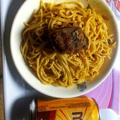 A picture of Oñion Spaghetti and Fried Fish.