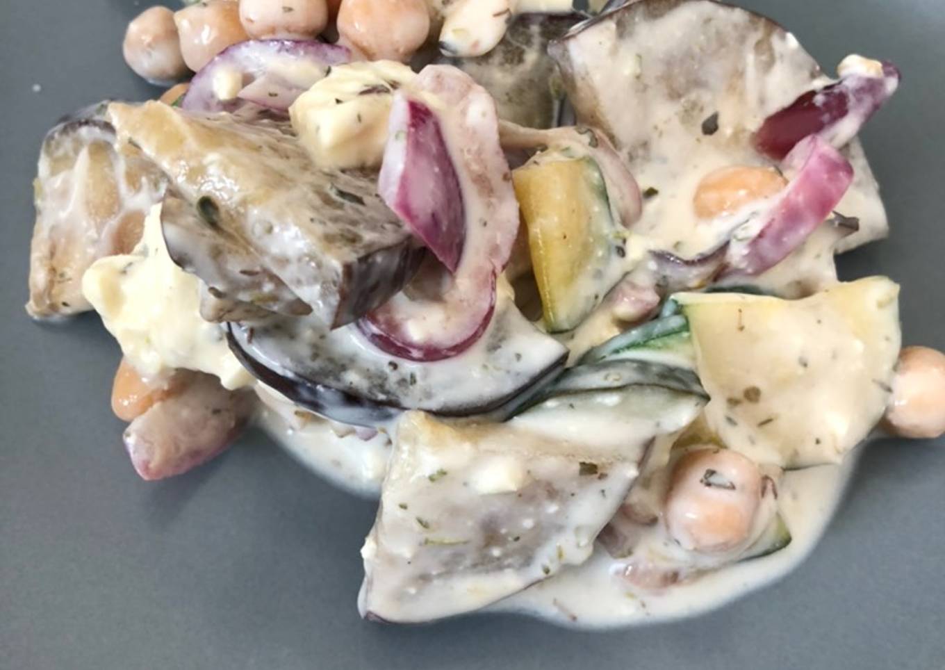 Eggplant and courgette salad with peas