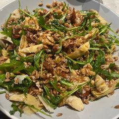 Farro salad with artichoke and sun-dried tomatoes A picture of Farro salad with artichoke and sun-dried tomatoes.