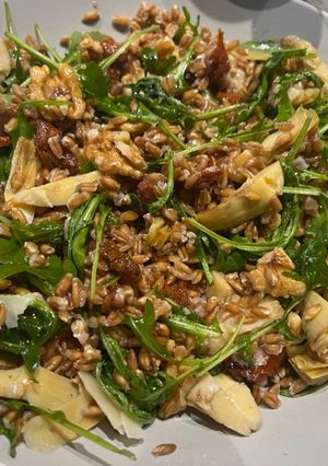 A picture of Farro salad with artichoke and sun-dried tomatoes.