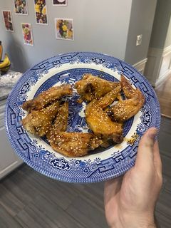 A picture of Air Fried Chicken Wings (Honey Sesame and Korean Hot and Honey).