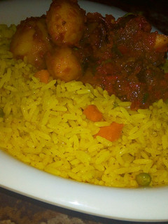 A picture of Fried rice with Irish &meat sauce.